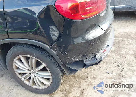 2014 Volkswagen Tiguan Sel z USA, uszkodzony, nr VIN WVGBV3AX3EW531961